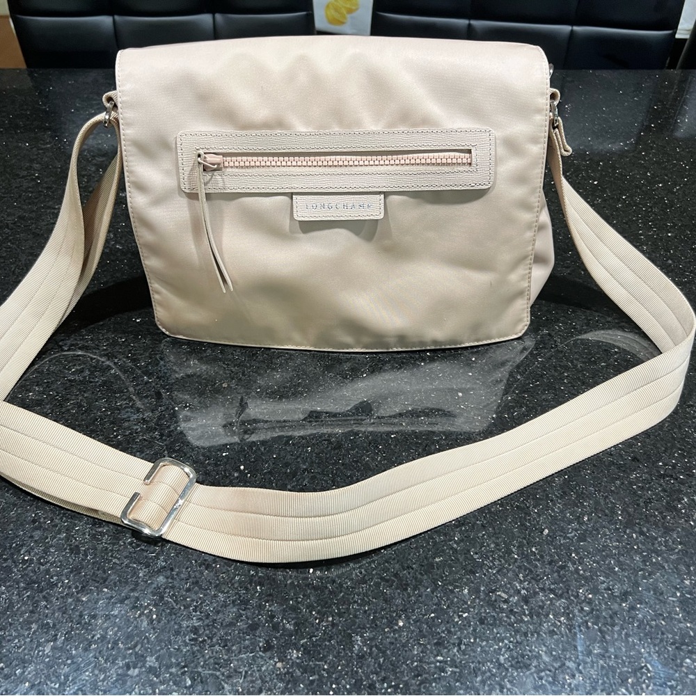 Beige Longchamp crossbody nylon messenger bag